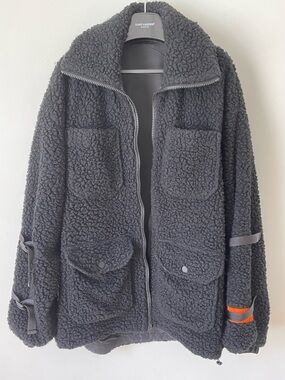 Heron Preston Black Jacket with Orange Brand Tag